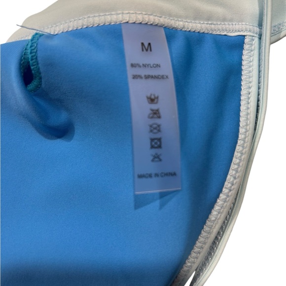 A very pretty, modest bikini in two tones of blue. Unbranded and NWOT. - Picture 4 of 6